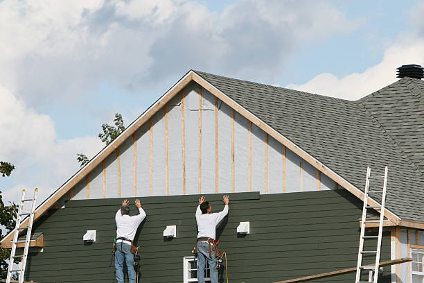 Professional Emergency Siding Repair technician working in Middlefield, OH